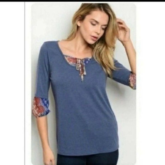 No brand / Not sure Tops - 🔥$5🔥SOFT BLUE TOP WITH DESIGNS-SIZE SMALL-NEW